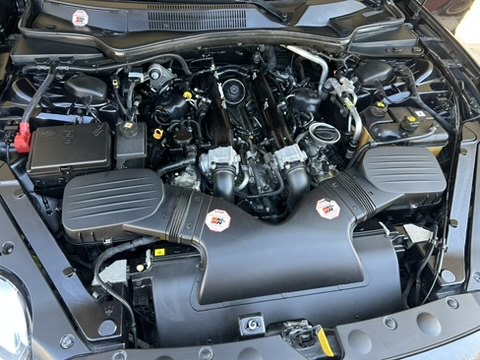 After — Engine bay cleaned by hand — grime and dust gone.